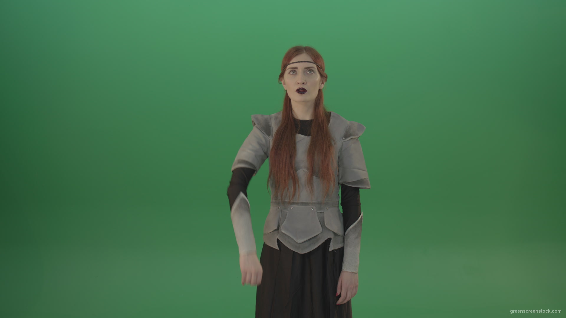 Actress-red-hair-girl-in-a-medieval-war-dress-crosses-praying-to-God-on-green-screen_002 Green Screen Stock
