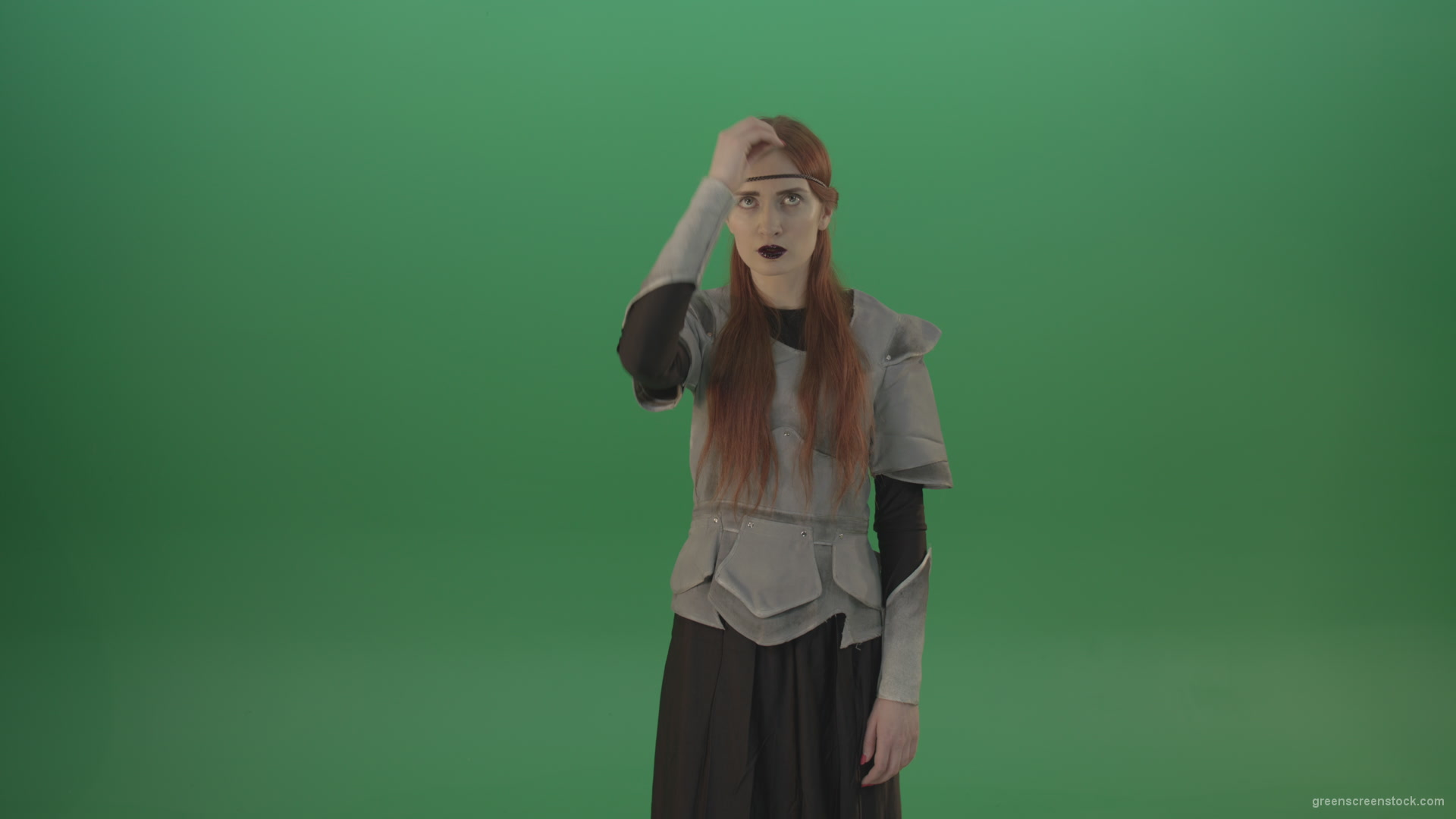 vj video background Actress-red-hair-girl-in-a-medieval-war-dress-crosses-praying-to-God-on-green-screen_003