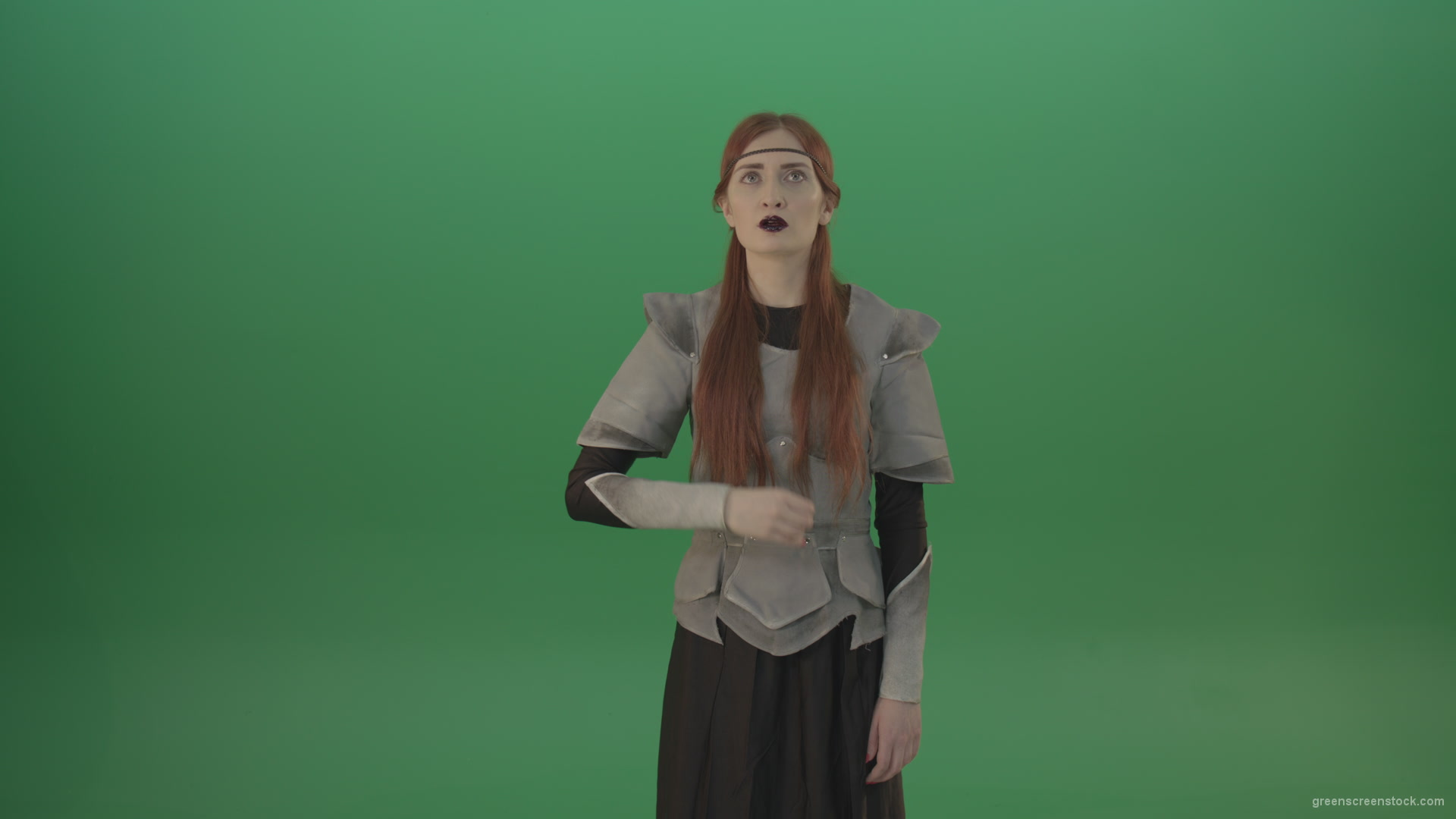 Actress-red-hair-girl-in-a-medieval-war-dress-crosses-praying-to-God-on-green-screen_004 Green Screen Stock
