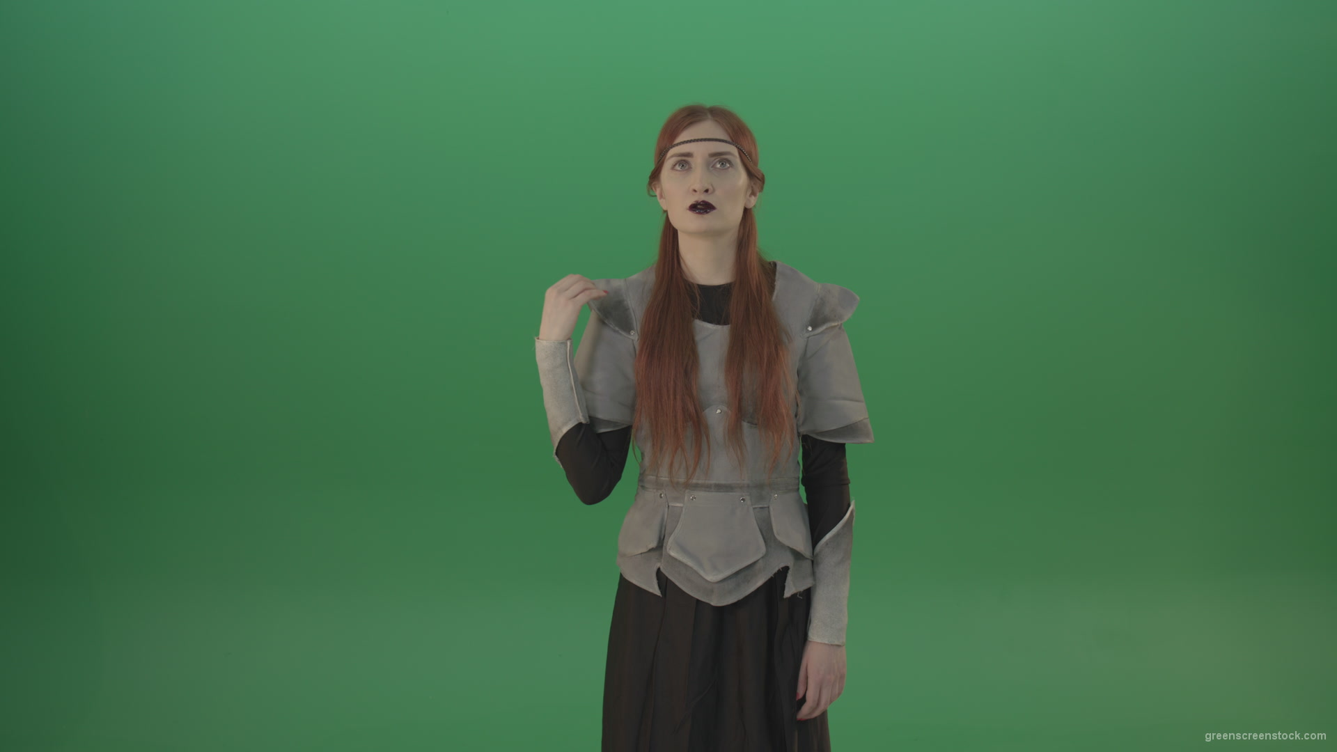 Actress-red-hair-girl-in-a-medieval-war-dress-crosses-praying-to-God-on-green-screen_005 Green Screen Stock