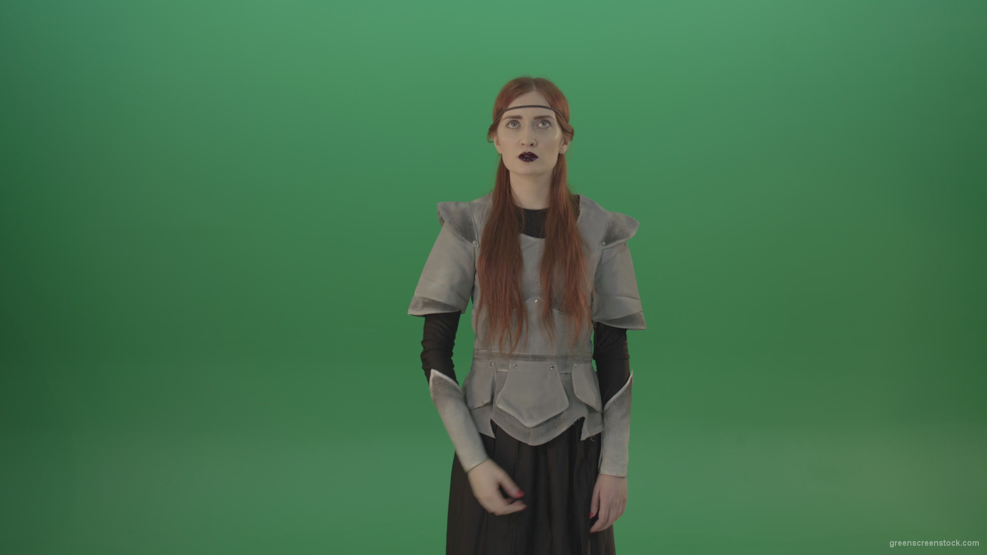 Actress-red-hair-girl-in-a-medieval-war-dress-crosses-praying-to-God-on-green-screen_008 Green Screen Stock