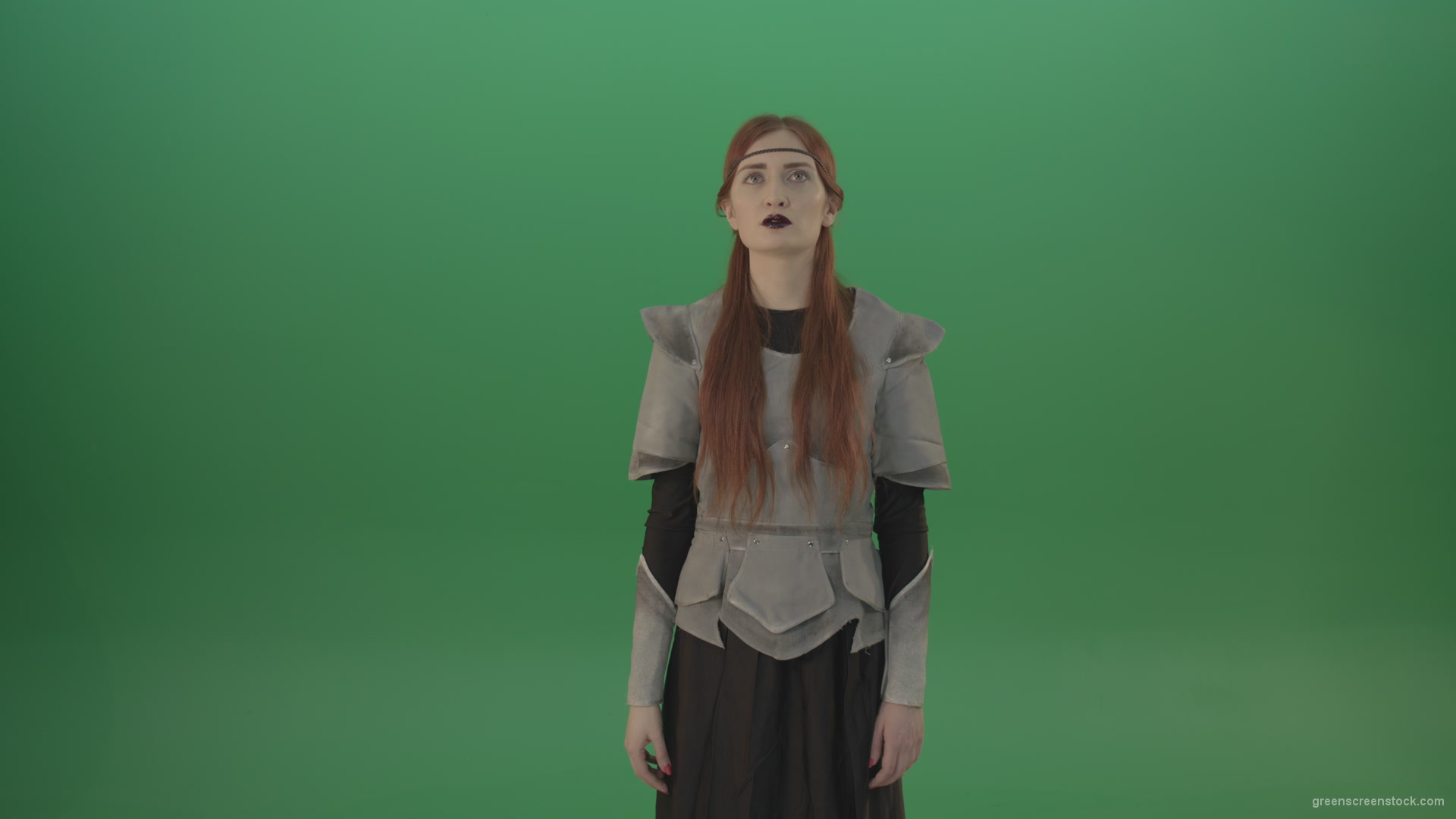 Actress-red-hair-girl-in-a-medieval-war-dress-crosses-praying-to-God-on-green-screen_009 Green Screen Stock