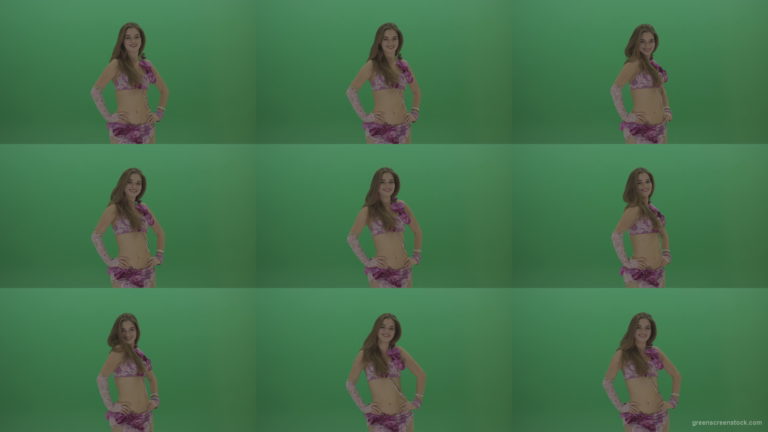 Beautiful-belly-dancer-in-purple-wear-winks-as-she-poses-over-green-screen-background Green Screen Stock