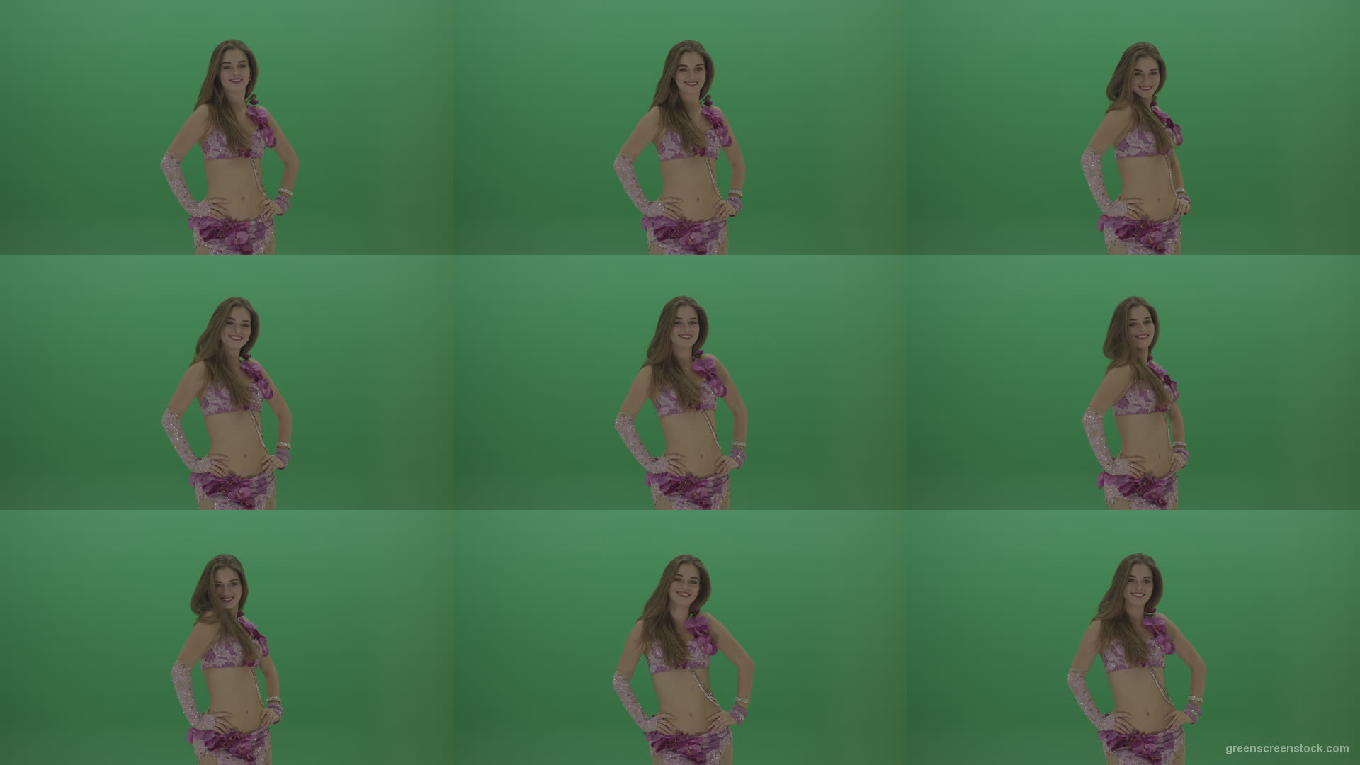 Beautiful-belly-dancer-in-purple-wear-winks-as-she-poses-over-green-screen-background Green Screen Stock