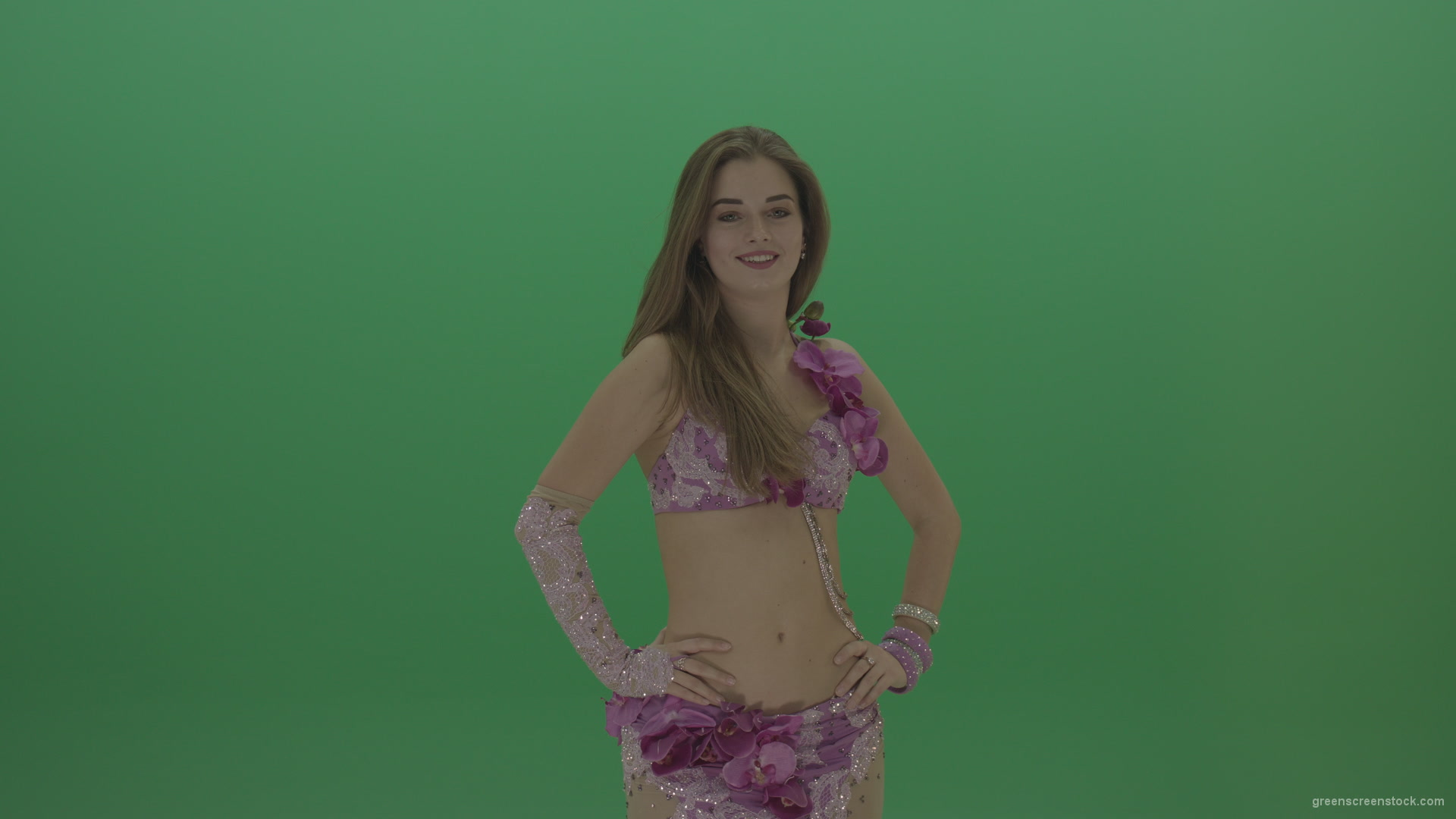 Beautiful-belly-dancer-in-purple-wear-winks-as-she-poses-over-green-screen-background_001 Green Screen Stock