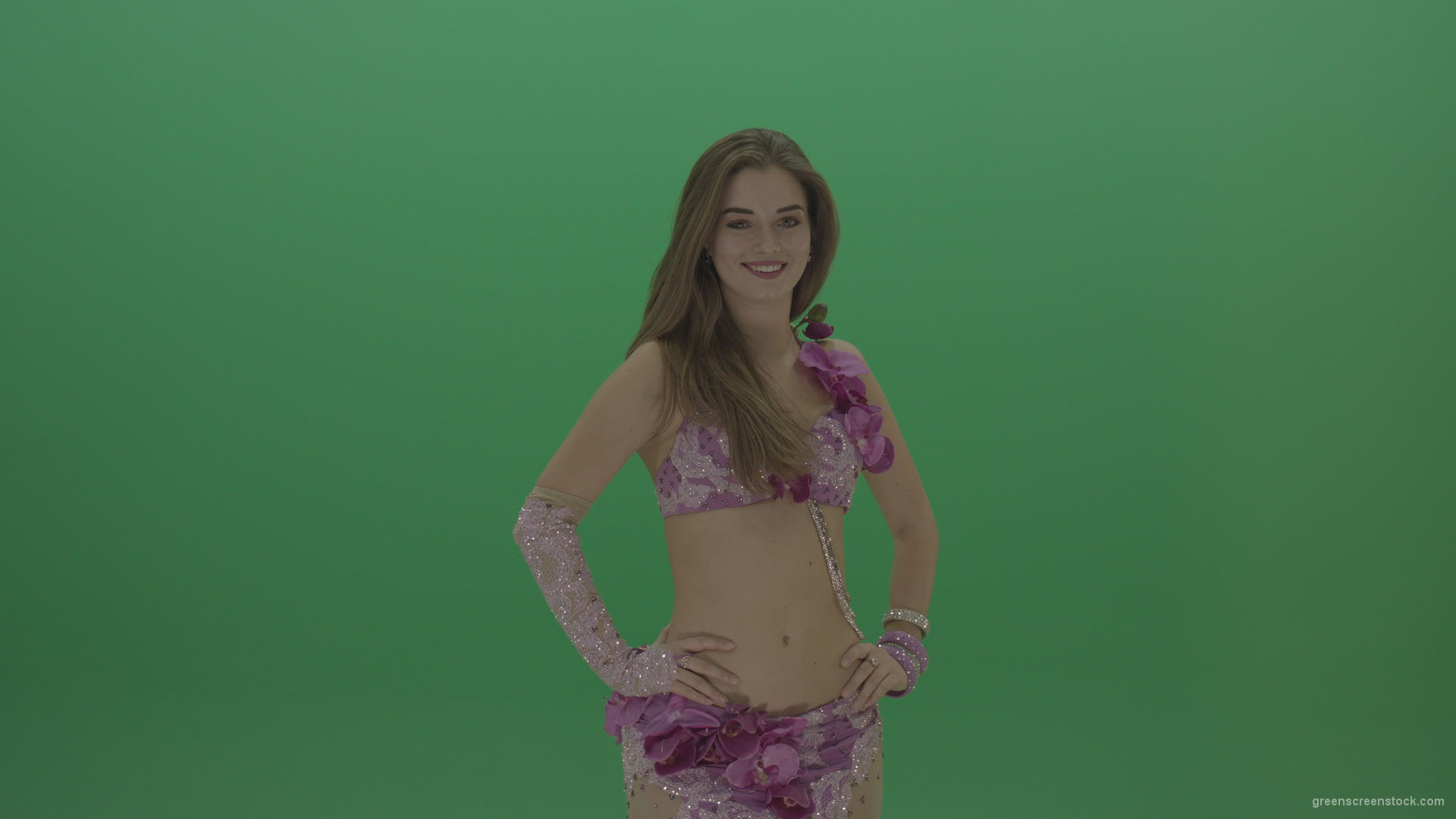 Beautiful-belly-dancer-in-purple-wear-winks-as-she-poses-over-green-screen-background_002 Green Screen Stock