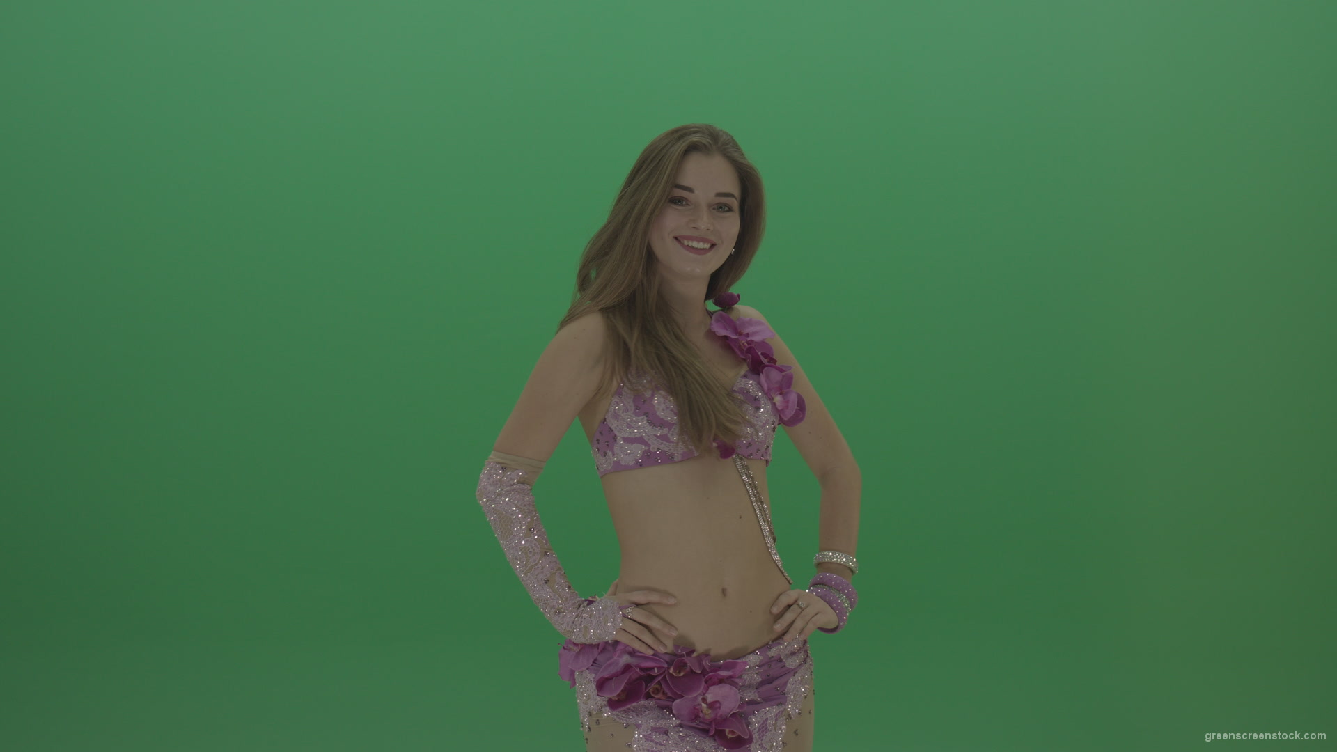 Beautiful-belly-dancer-in-purple-wear-winks-as-she-poses-over-green-screen-background_004 Green Screen Stock