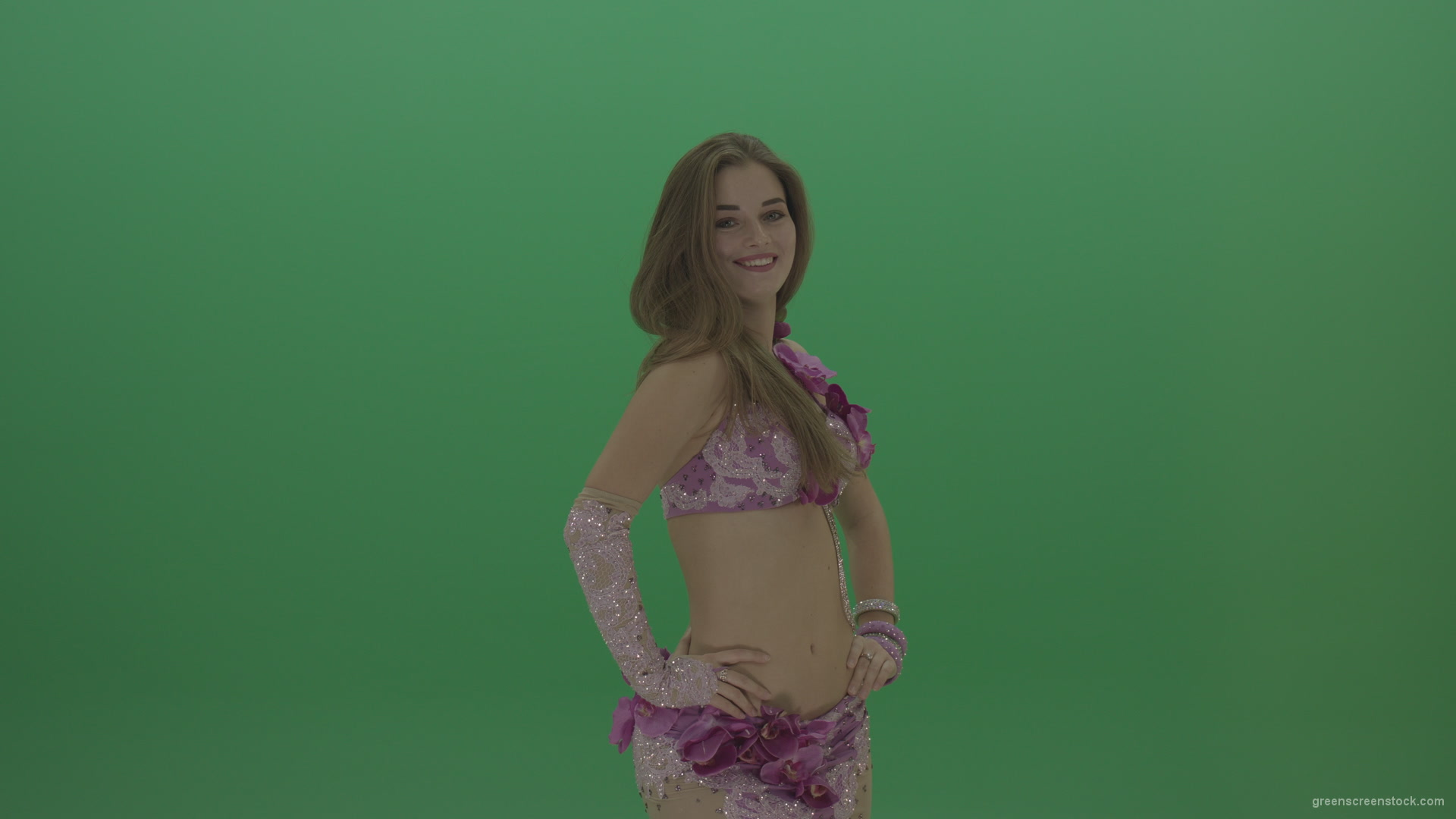 Beautiful-belly-dancer-in-purple-wear-winks-as-she-poses-over-green-screen-background_006 Green Screen Stock