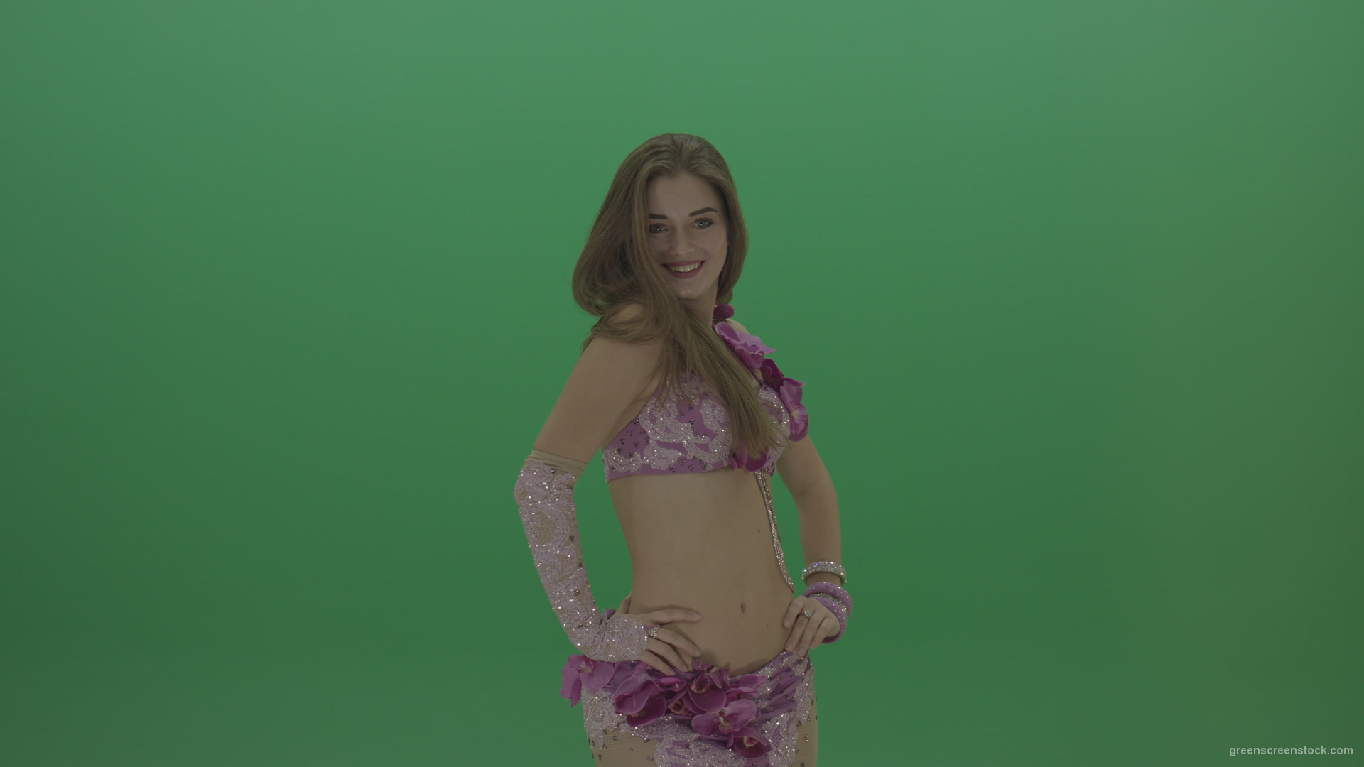 Beautiful-belly-dancer-in-purple-wear-winks-as-she-poses-over-green-screen-background_007 Green Screen Stock