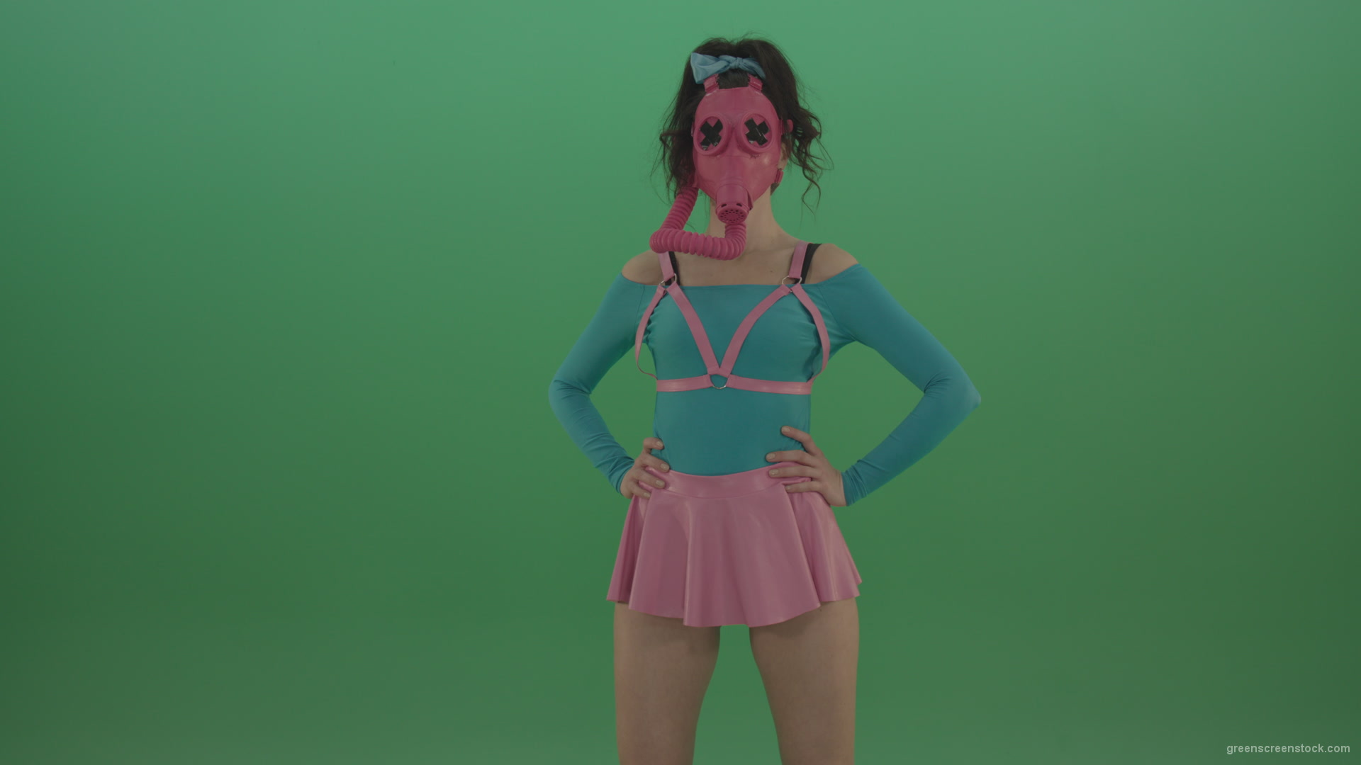 Beautiful-erotic-dance-from-a-woman-in-a-mask-in-a-pink-suit-on-green-background_001 Green Screen Stock