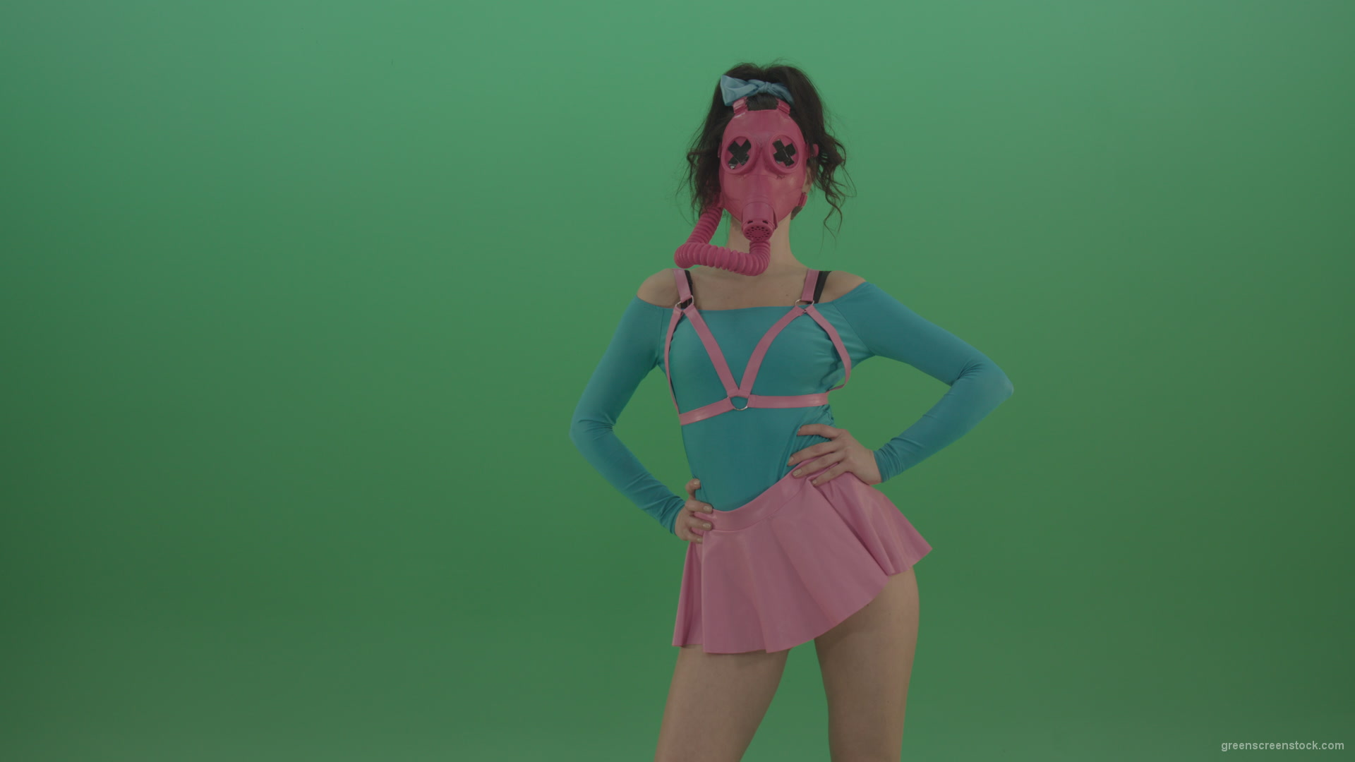 Beautiful-erotic-dance-from-a-woman-in-a-mask-in-a-pink-suit-on-green-background_002 Green Screen Stock