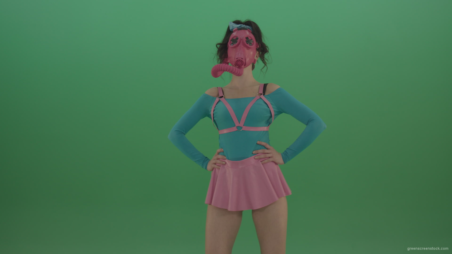 Beautiful-erotic-dance-from-a-woman-in-a-mask-in-a-pink-suit-on-green-background_006 Green Screen Stock
