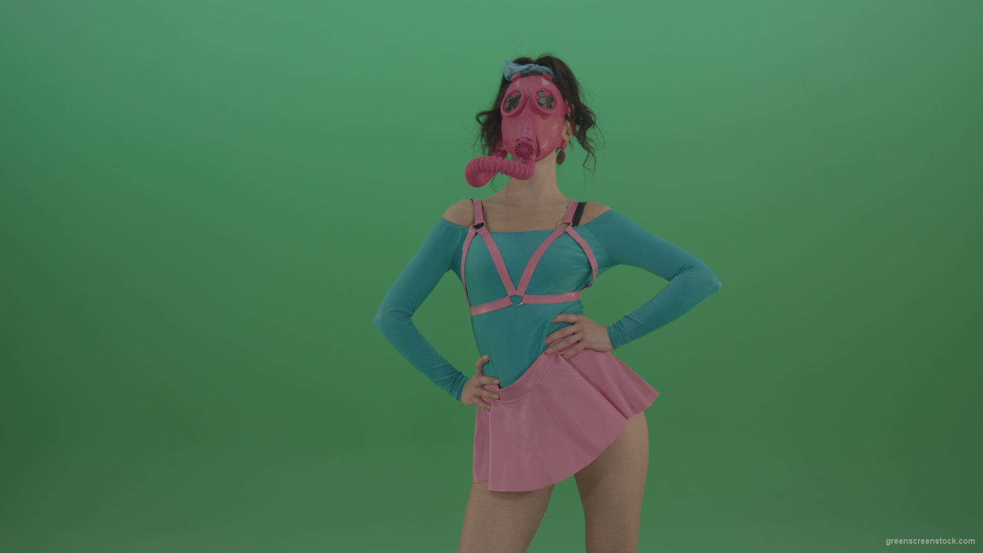 Beautiful-erotic-dance-from-a-woman-in-a-mask-in-a-pink-suit-on-green-background_007 Green Screen Stock