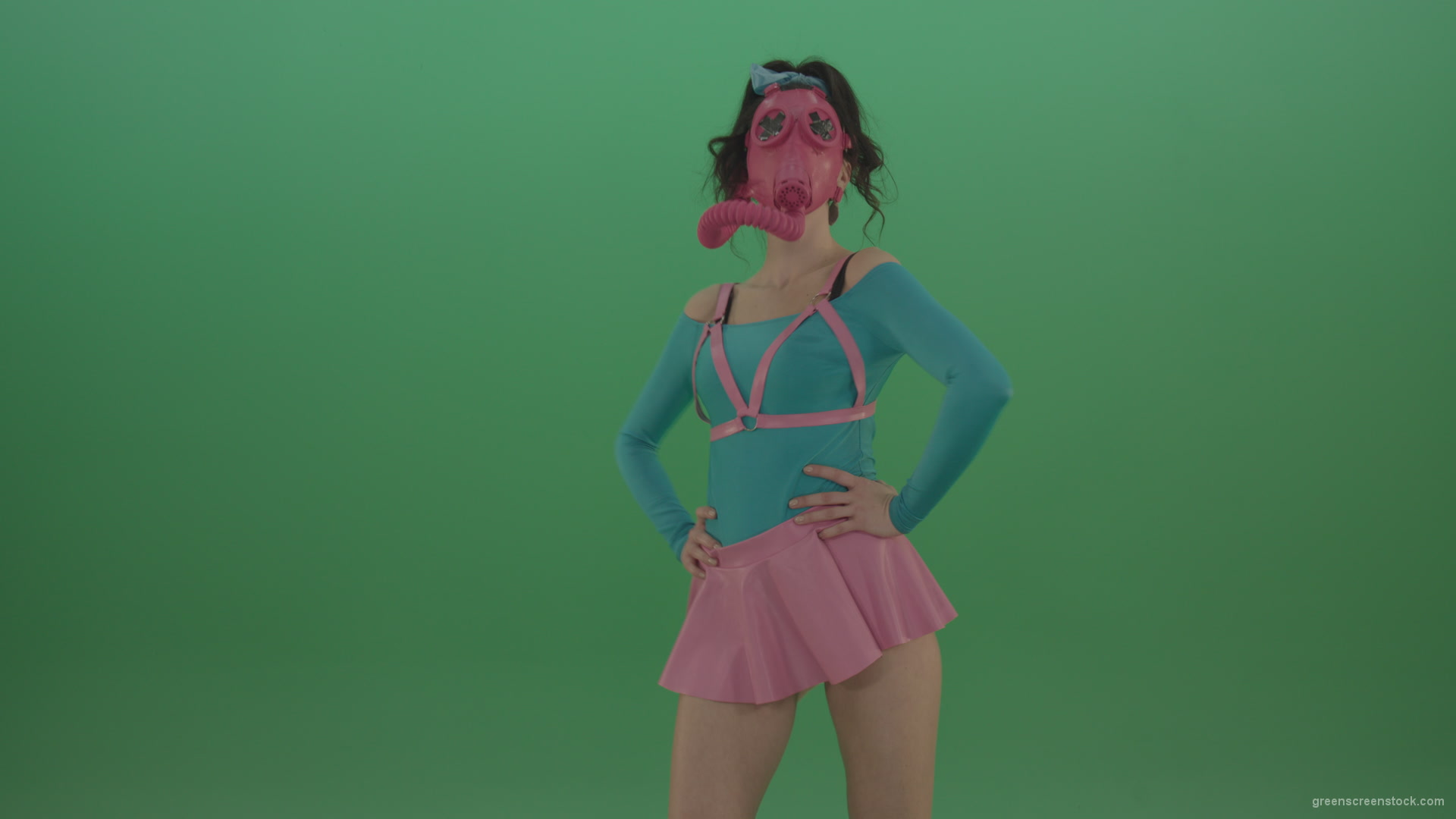 Beautiful-erotic-dance-from-a-woman-in-a-mask-in-a-pink-suit-on-green-background_009 Green Screen Stock