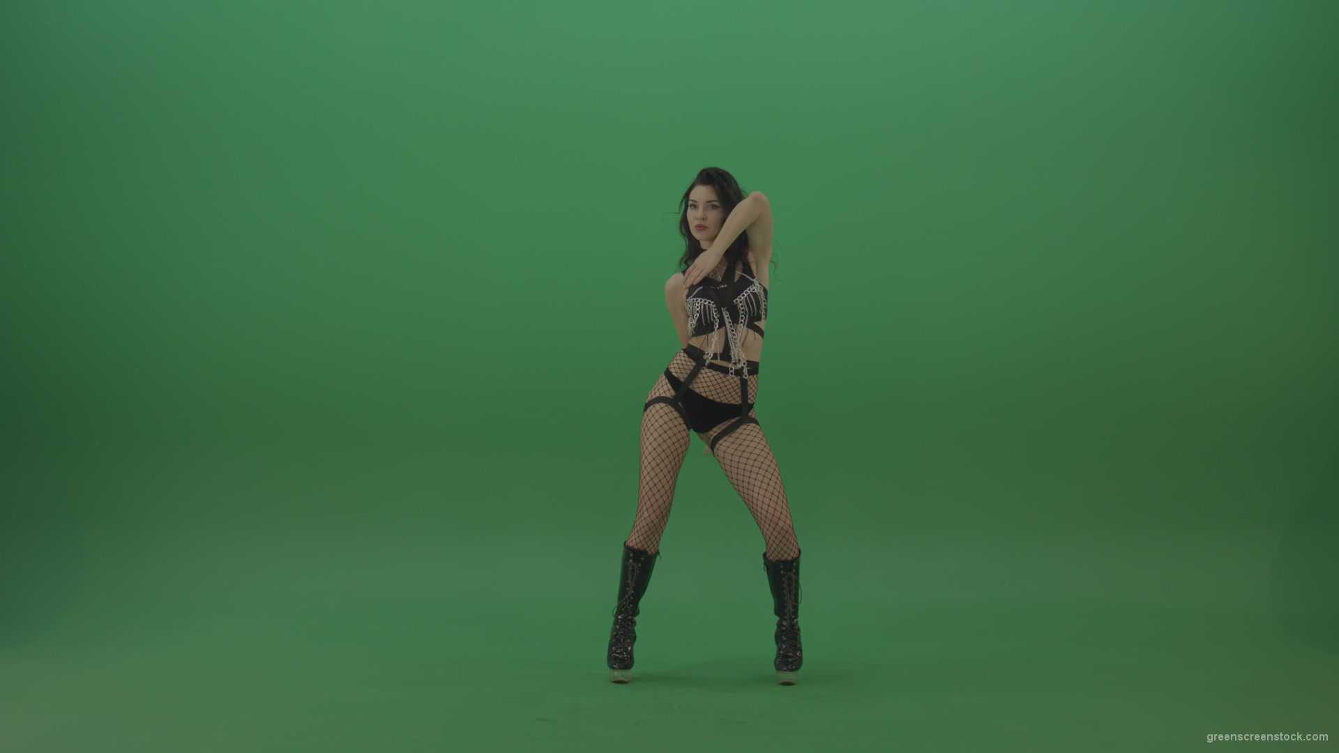 Beautiful-erotic-dressed-girl-seductively-dancing-on-green-background_009 Green Screen Stock