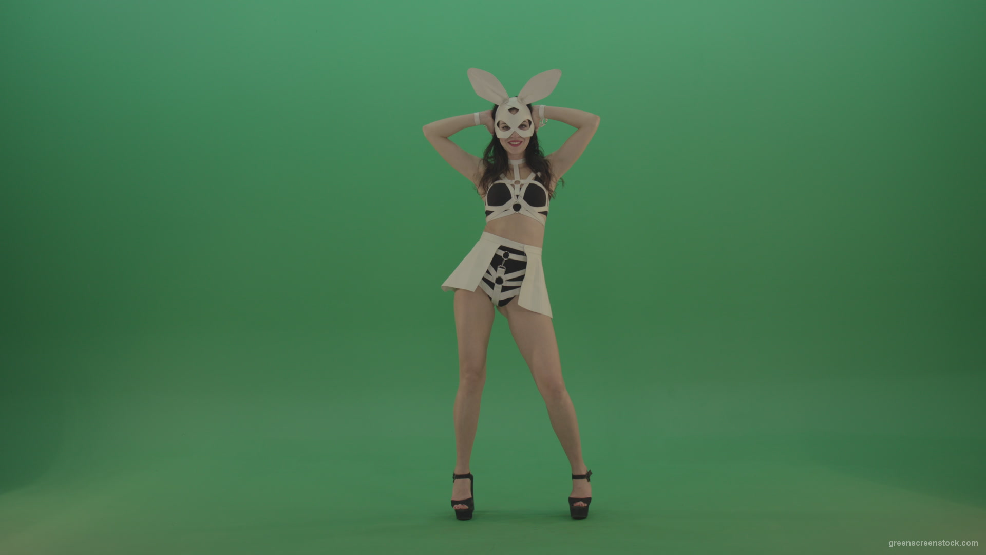 Black-white-sexy-costume-the-girl-moves-the-basin-in-different-directions-on-chromakey-background_001 Green Screen Stock