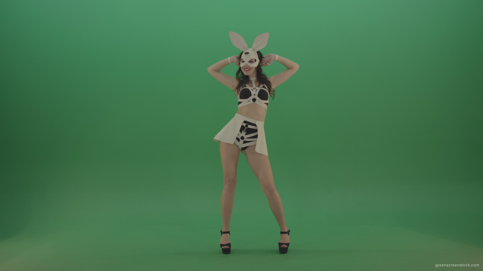 Black-white-sexy-costume-the-girl-moves-the-basin-in-different-directions-on-chromakey-background_006 Green Screen Stock