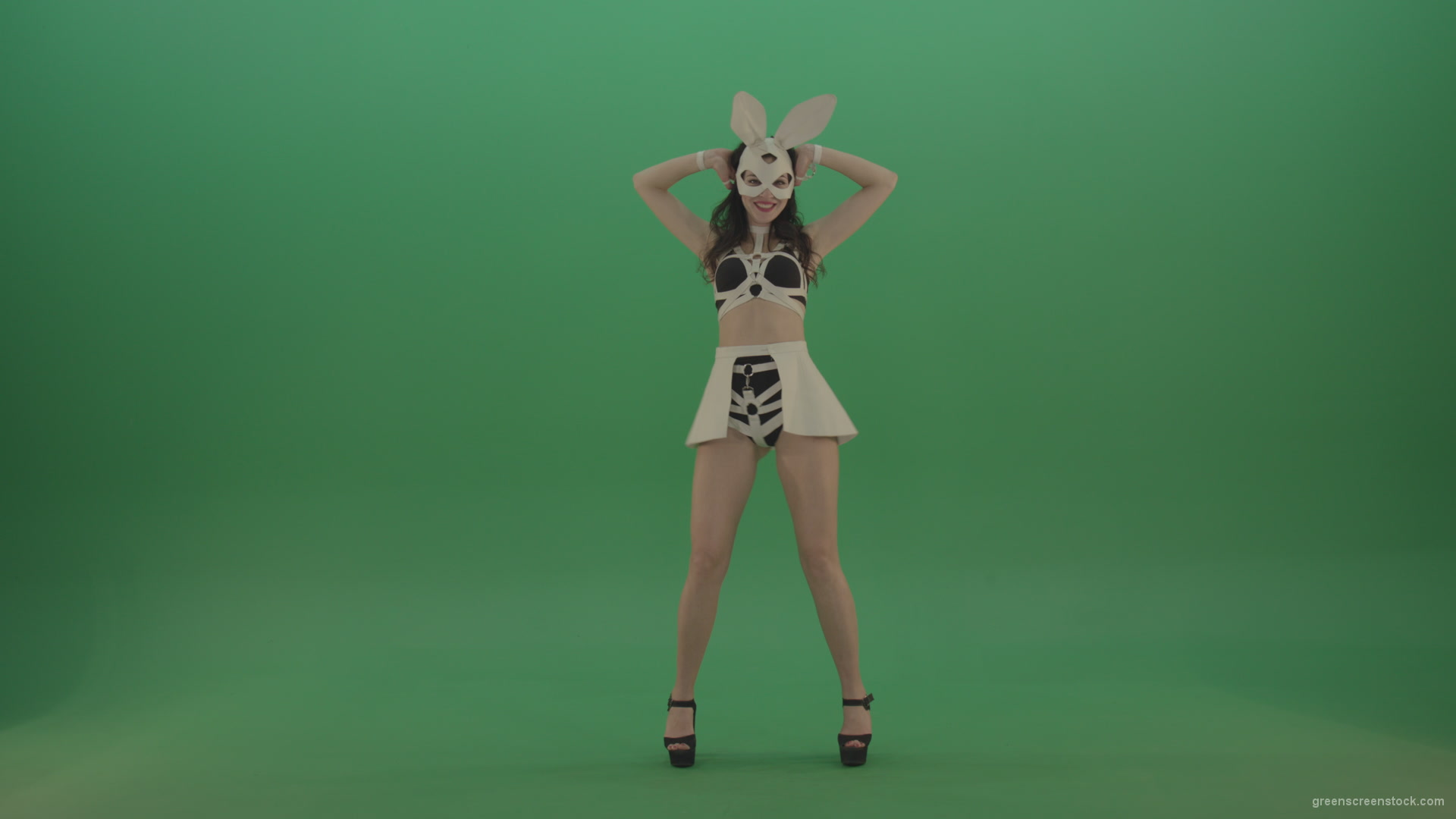 Black-white-sexy-costume-the-girl-moves-the-basin-in-different-directions-on-chromakey-background_007 Green Screen Stock