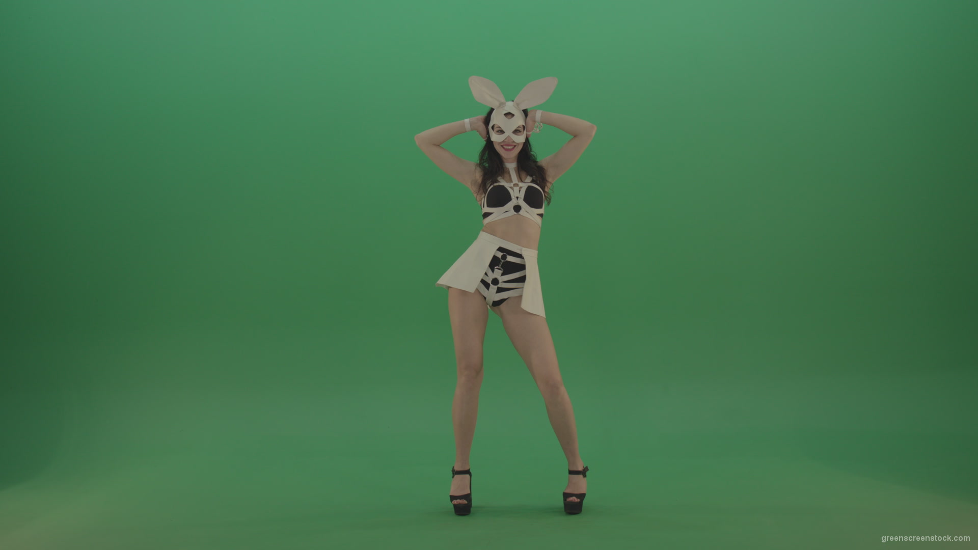 Black-white-sexy-costume-the-girl-moves-the-basin-in-different-directions-on-chromakey-background_009 Green Screen Stock