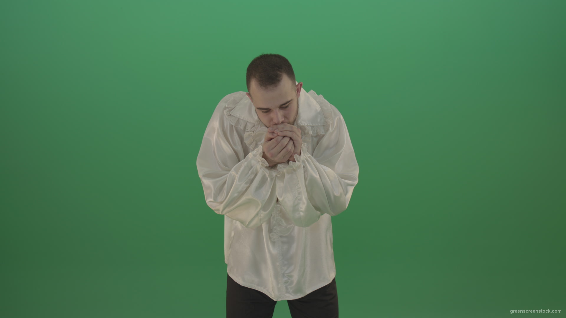 Boy-gives-flower-squeezing-in-the-sleeves-elegantly-in-hand-isolated-on-green-screen_005 Green Screen Stock