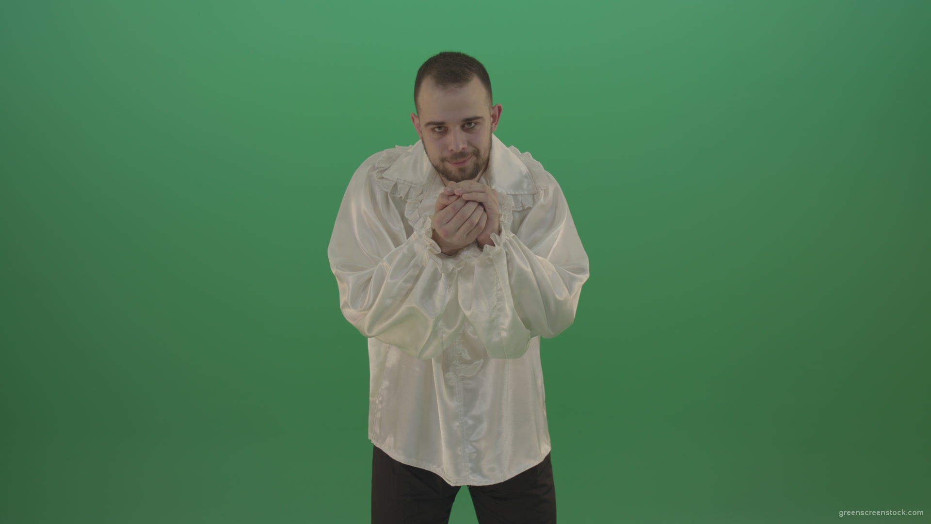 Boy-gives-flower-squeezing-in-the-sleeves-elegantly-in-hand-isolated-on-green-screen_006 Green Screen Stock
