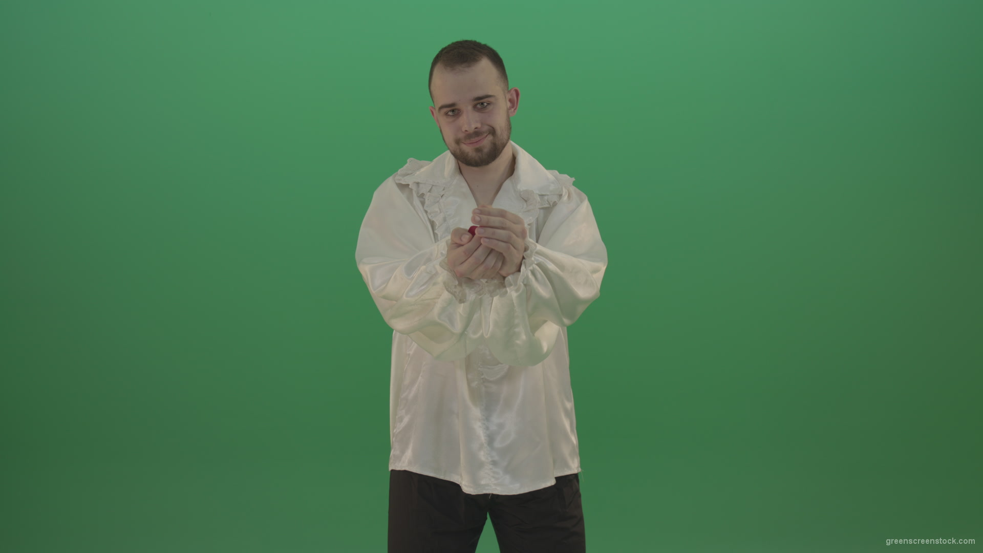 Boy-gives-flower-squeezing-in-the-sleeves-elegantly-in-hand-isolated-on-green-screen_007 Green Screen Stock