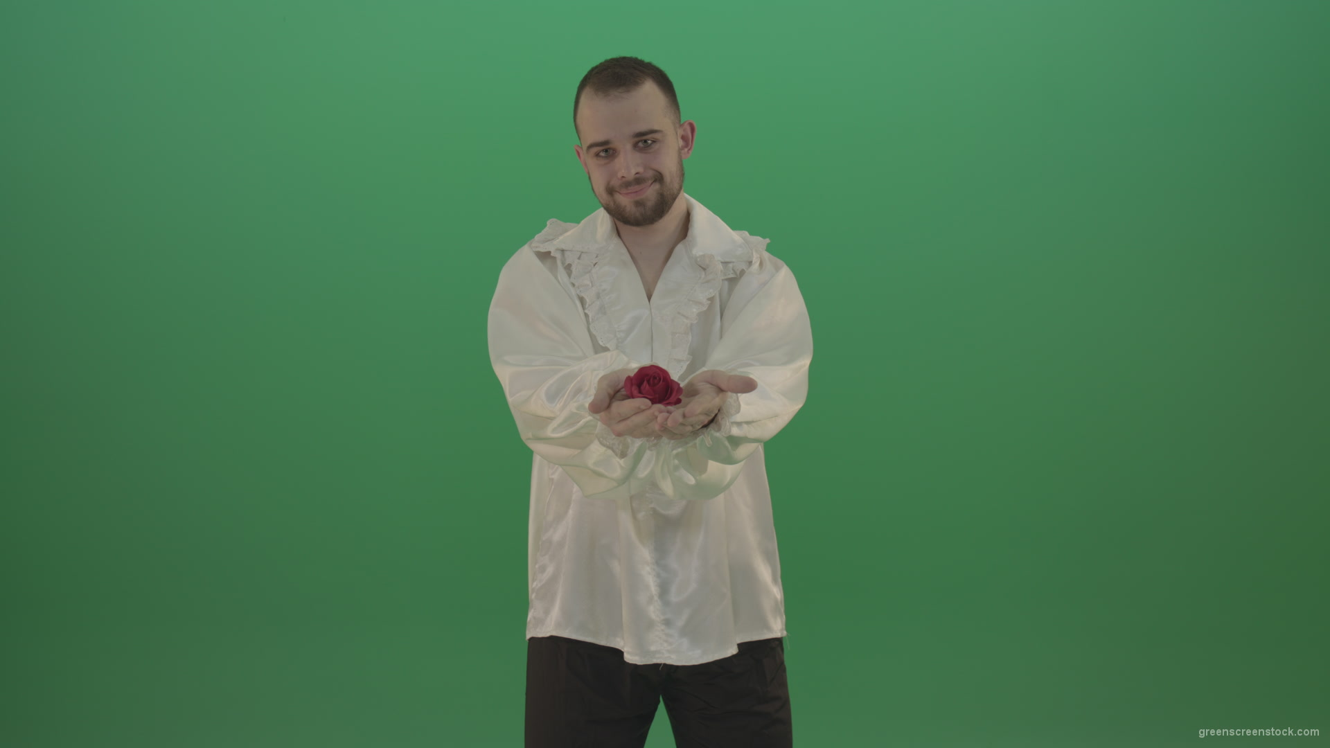 Boy-gives-flower-squeezing-in-the-sleeves-elegantly-in-hand-isolated-on-green-screen_008 Green Screen Stock