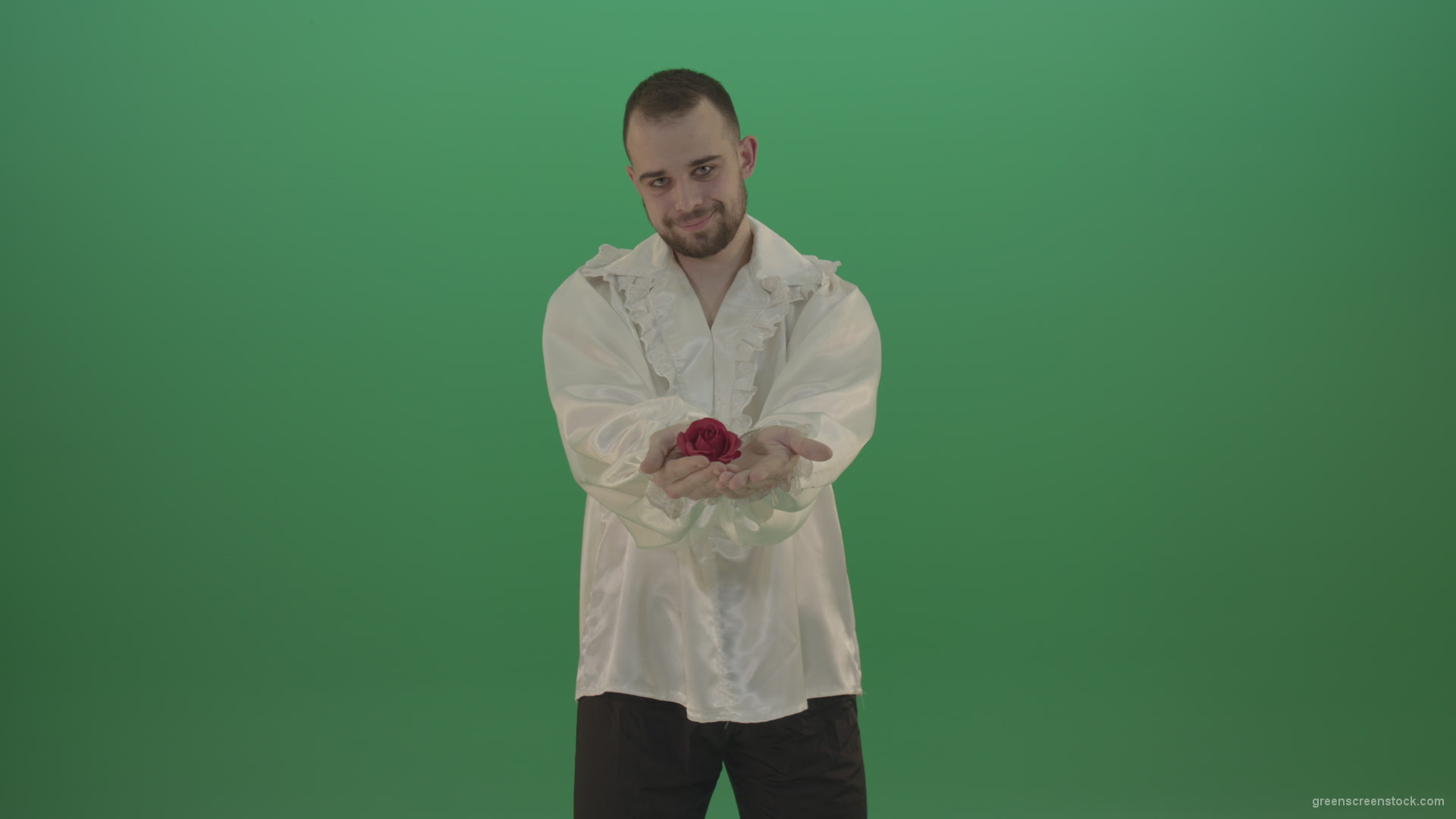 Boy-gives-flower-squeezing-in-the-sleeves-elegantly-in-hand-isolated-on-green-screen_009 Green Screen Stock
