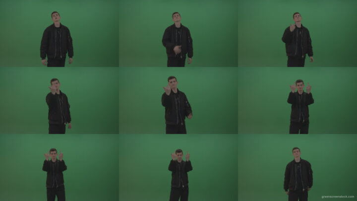 Boy-in-black-wear-displays-the-kill-sign-and-two-middle-fingers-in-the-air-over-chromakey-background Green Screen Stock