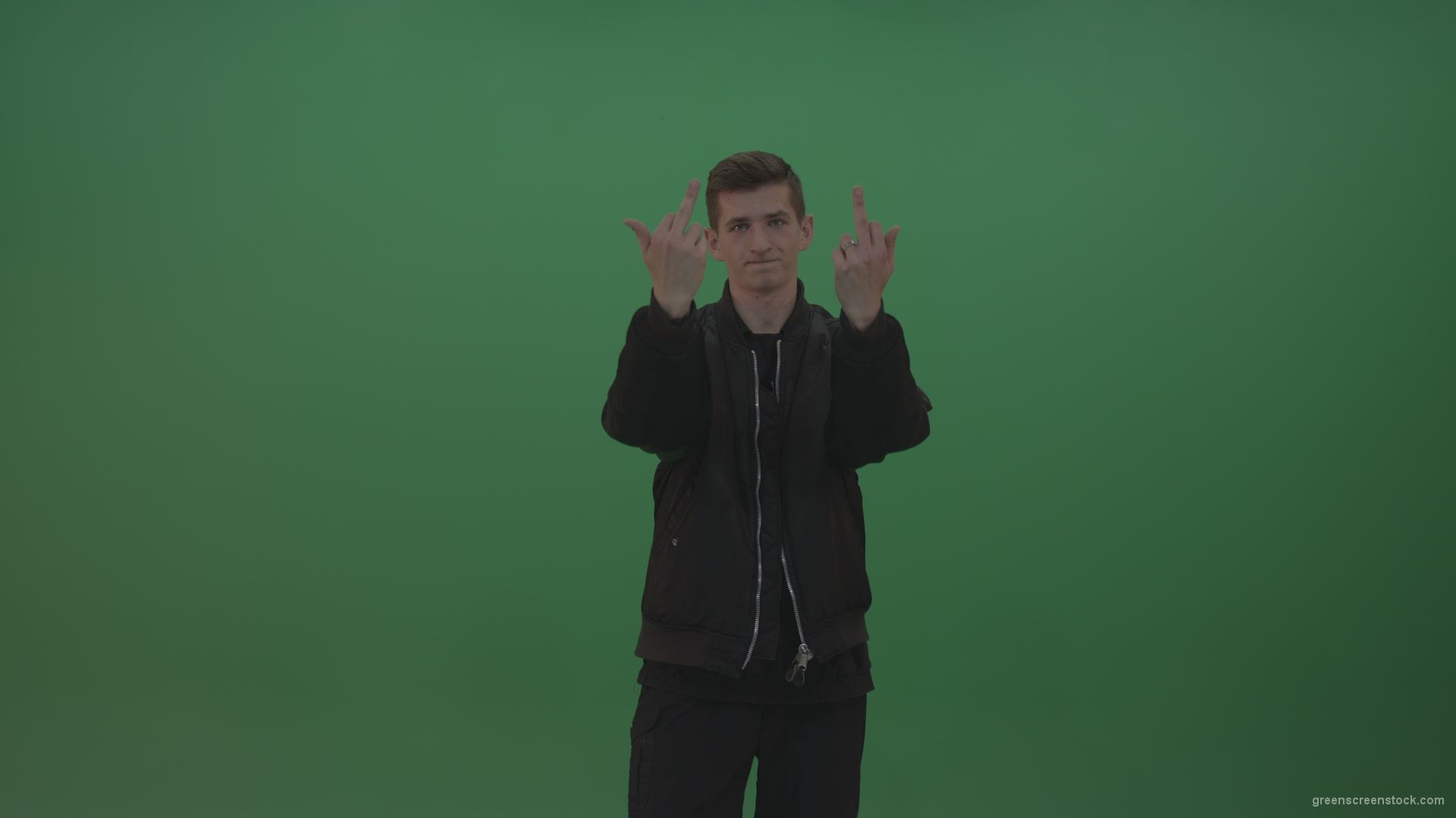 Boy-in-black-wear-displays-the-kill-sign-and-two-middle-fingers-in-the-air-over-chromakey-background_006 Green Screen Stock