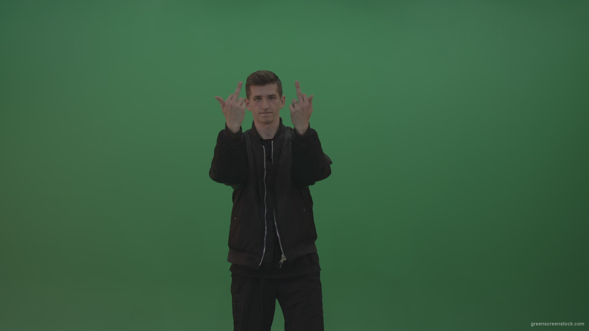 Boy-in-black-wear-displays-the-kill-sign-and-two-middle-fingers-in-the-air-over-chromakey-background_007 Green Screen Stock
