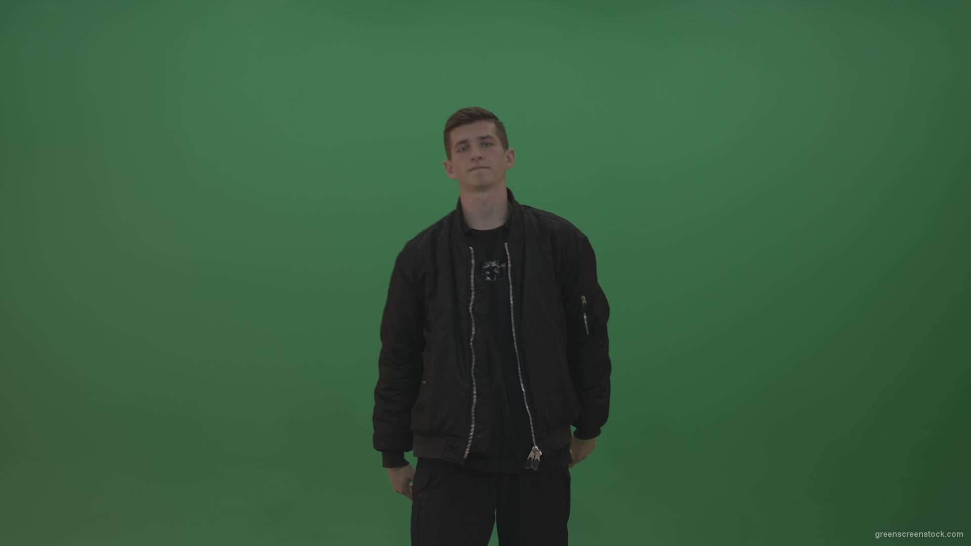 Boy-in-black-wear-displays-the-kill-sign-and-two-middle-fingers-in-the-air-over-chromakey-background_009 Green Screen Stock