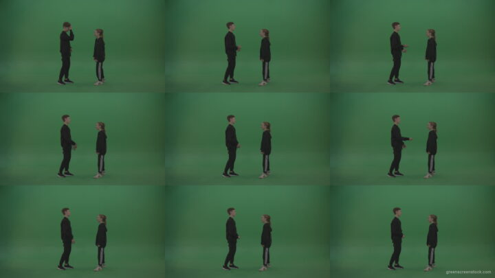 Boy-in-black-wear-talks-to-girl-over-chromakey-background Green Screen Stock