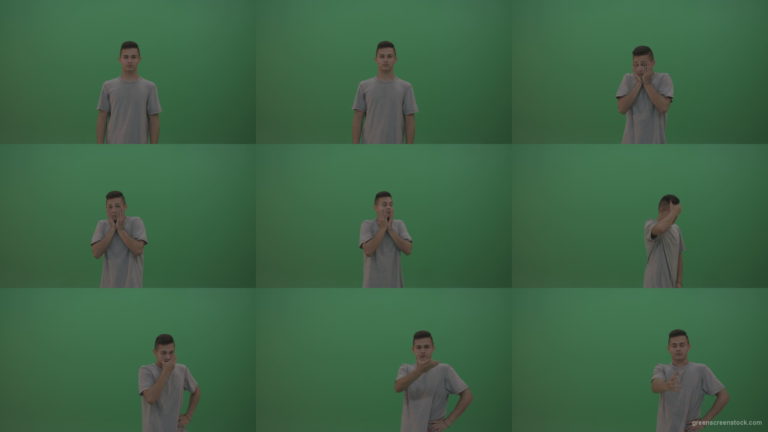 Boy-in-grey-wear-expresses-disappointment-over-green-screen-background Green Screen Stock