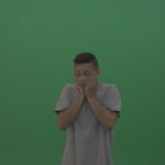 vj video background Boy-in-grey-wear-expresses-disappointment-over-green-screen-background_003