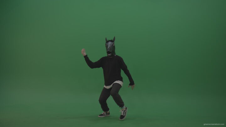 vj video background Boy-in-horse-head-costume-dances-over-green-screen-background_003