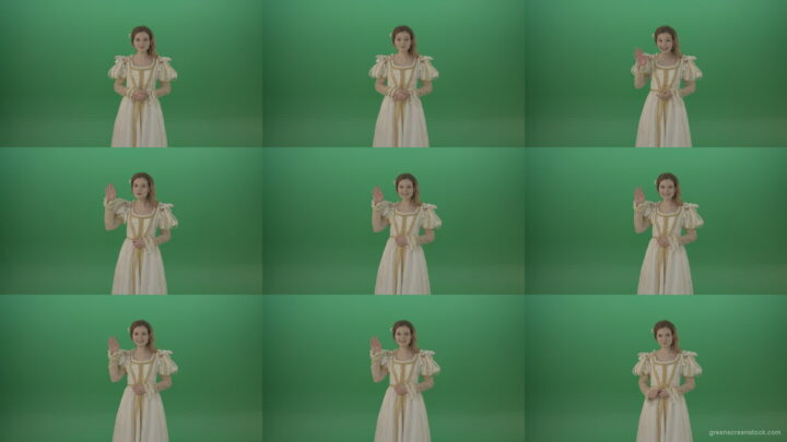 Cheerful-and-satisfied-girl-in-a-white-suit-telling-her-waving-her-hand-isolated-on-green-screen Green Screen Stock