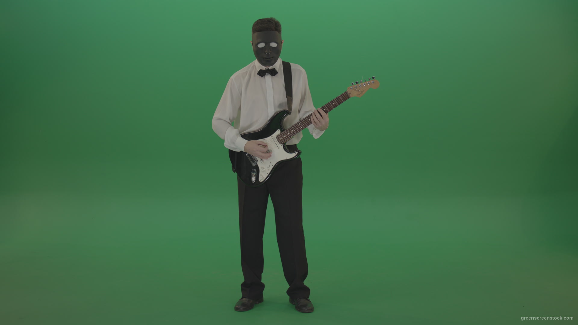 Classic-guitarist-in-white-shirt-play-guitar-in-mask-isolated-on-green-screen_001 Green Screen Stock