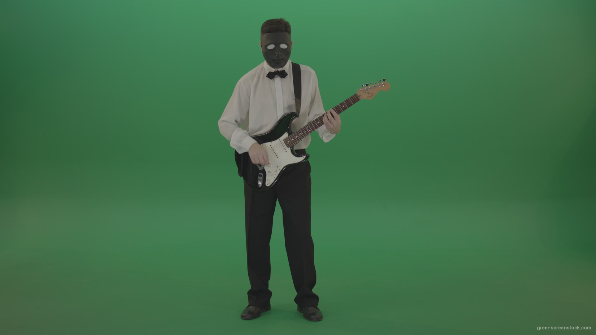 Classic-guitarist-in-white-shirt-play-guitar-in-mask-isolated-on-green-screen_002 Green Screen Stock