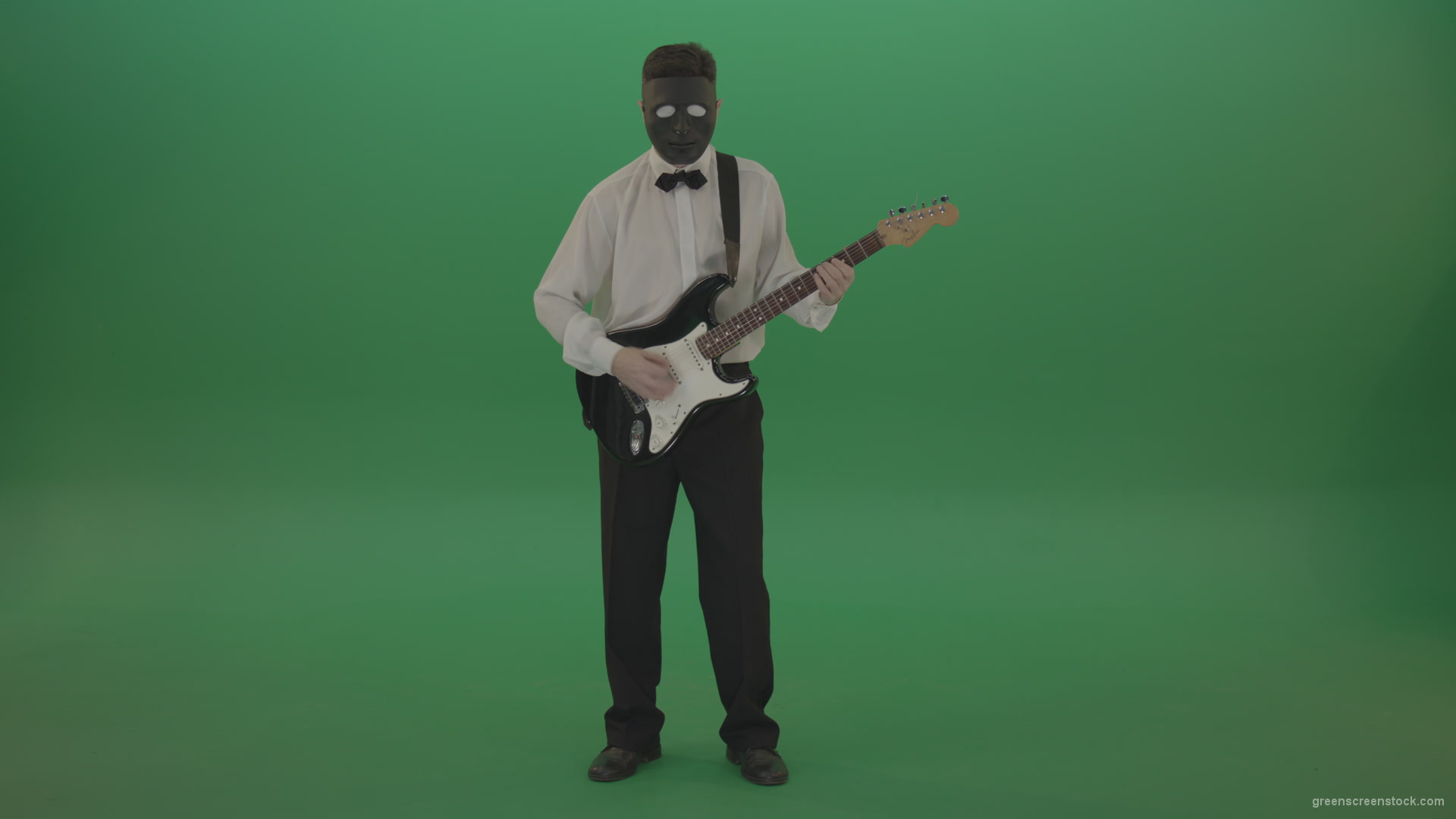 Classic-guitarist-in-white-shirt-play-guitar-in-mask-isolated-on-green-screen_004 Green Screen Stock