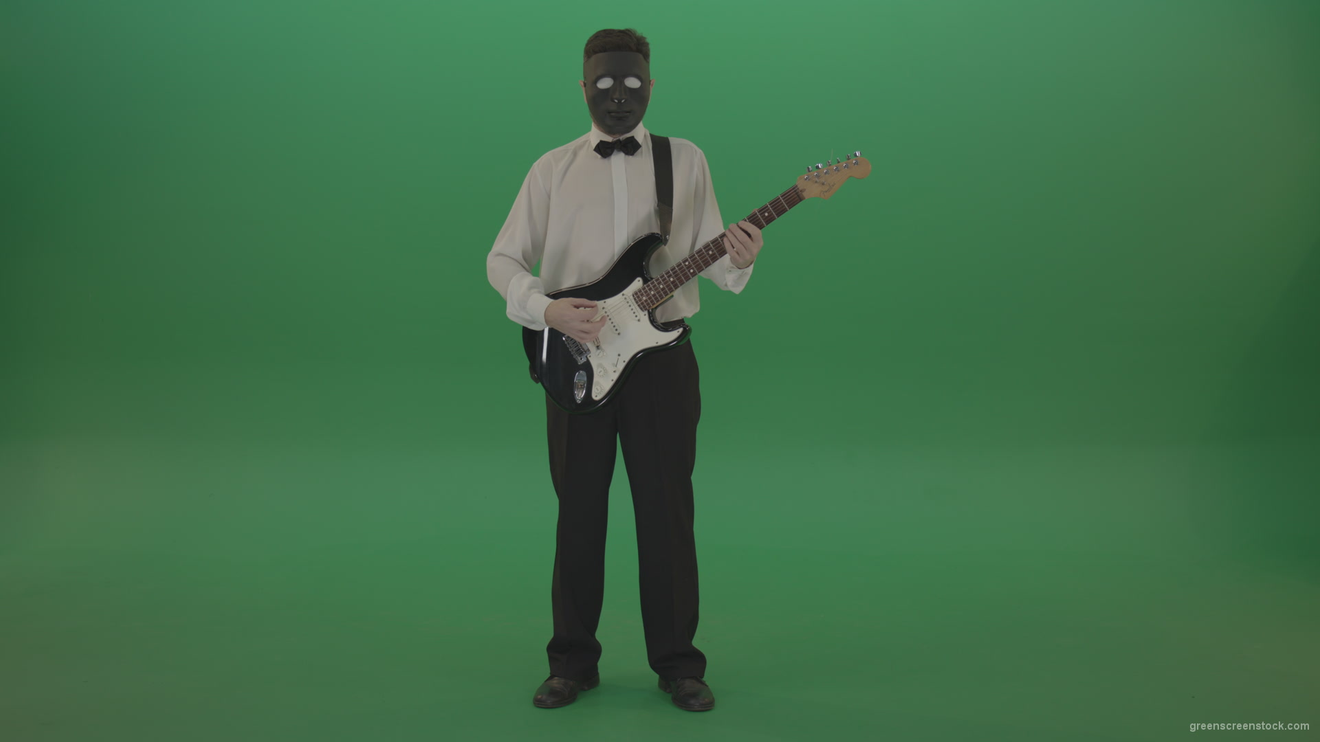 Classic-guitarist-in-white-shirt-play-guitar-in-mask-isolated-on-green-screen_005 Green Screen Stock