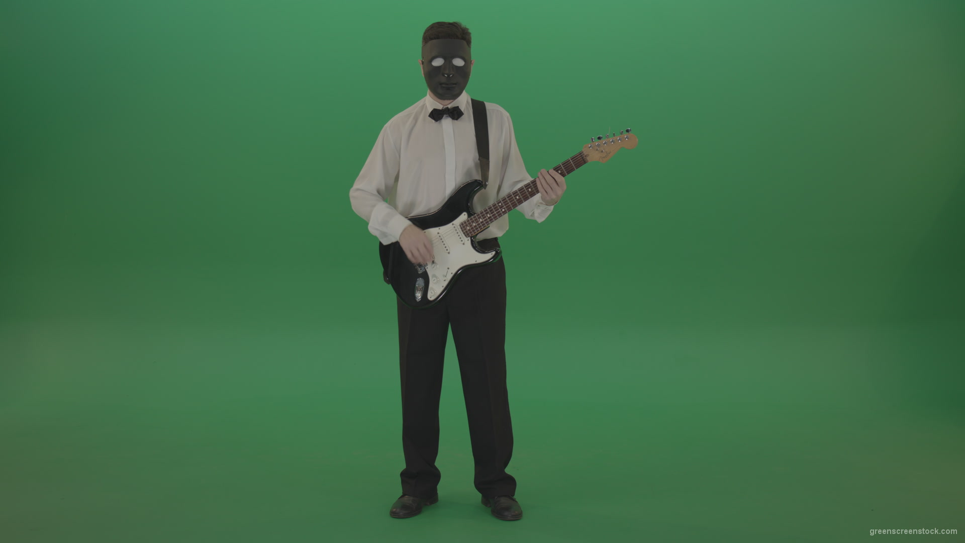 Classic-guitarist-in-white-shirt-play-guitar-in-mask-isolated-on-green-screen_007 Green Screen Stock