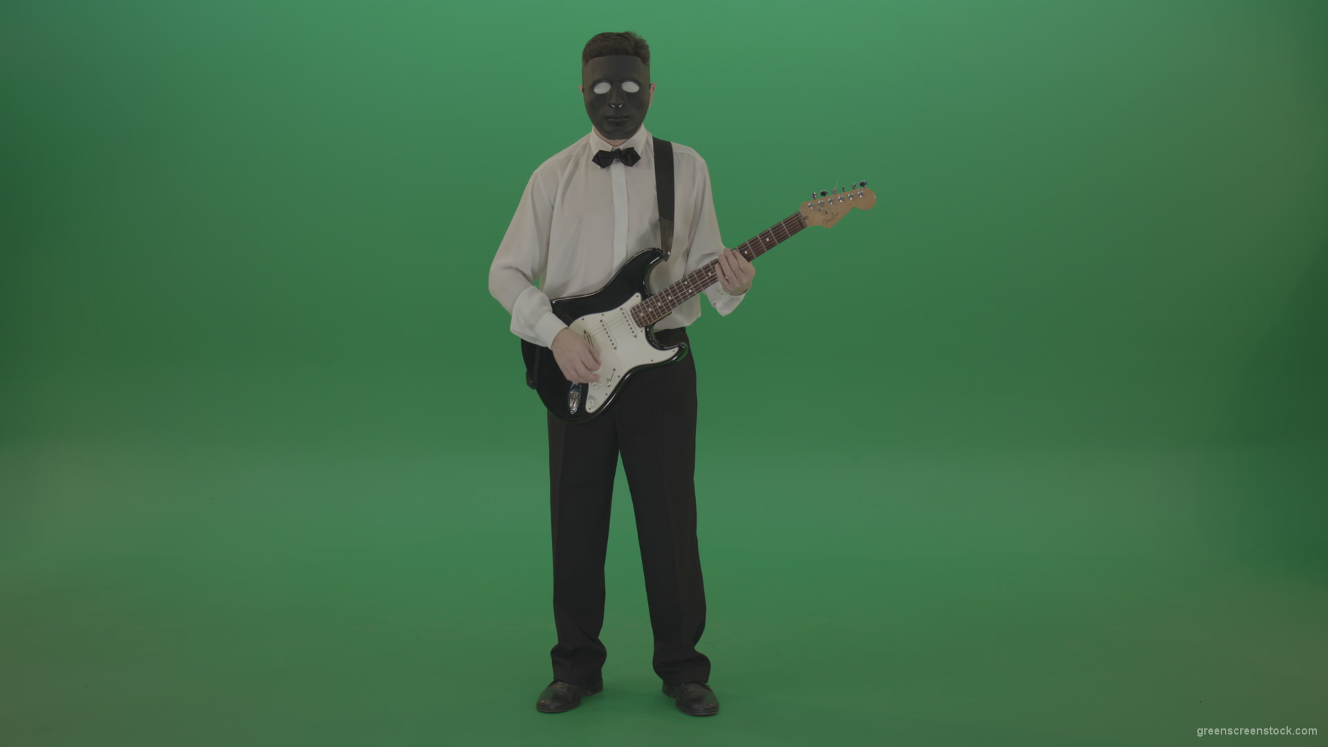 Classic-guitarist-in-white-shirt-play-guitar-in-mask-isolated-on-green-screen_008 Green Screen Stock