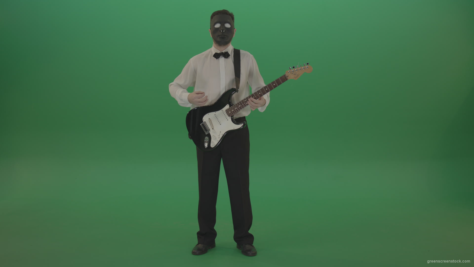 Classic-guitarist-in-white-shirt-play-guitar-in-mask-isolated-on-green-screen_009 Green Screen Stock