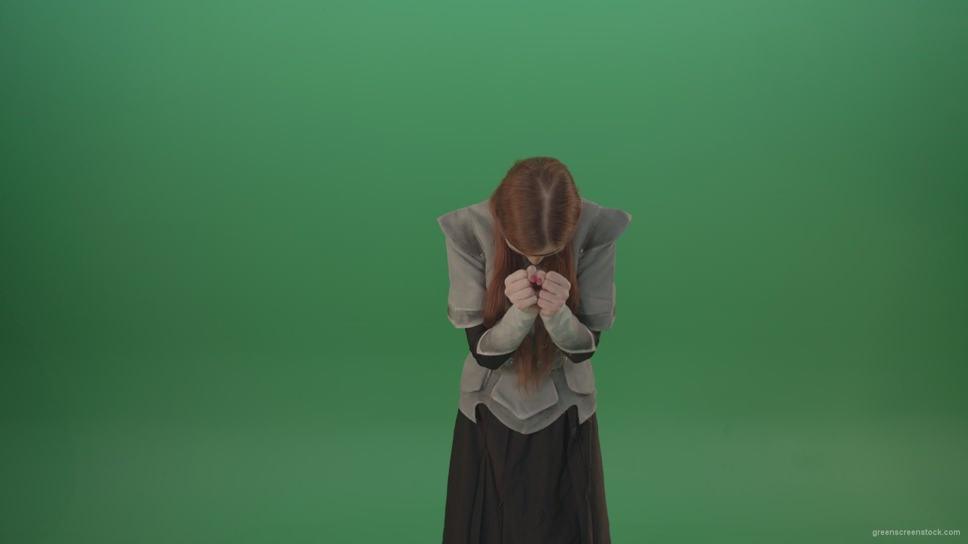 Cried-warrior-girl-releases-all-her-energy-cosplay-on-a-green-background_005 Green Screen Stock