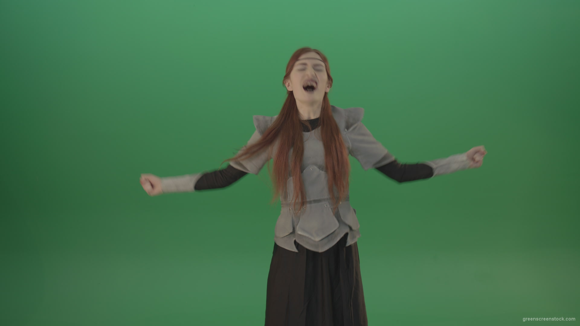 Cried-warrior-girl-releases-all-her-energy-cosplay-on-a-green-background_006 Green Screen Stock