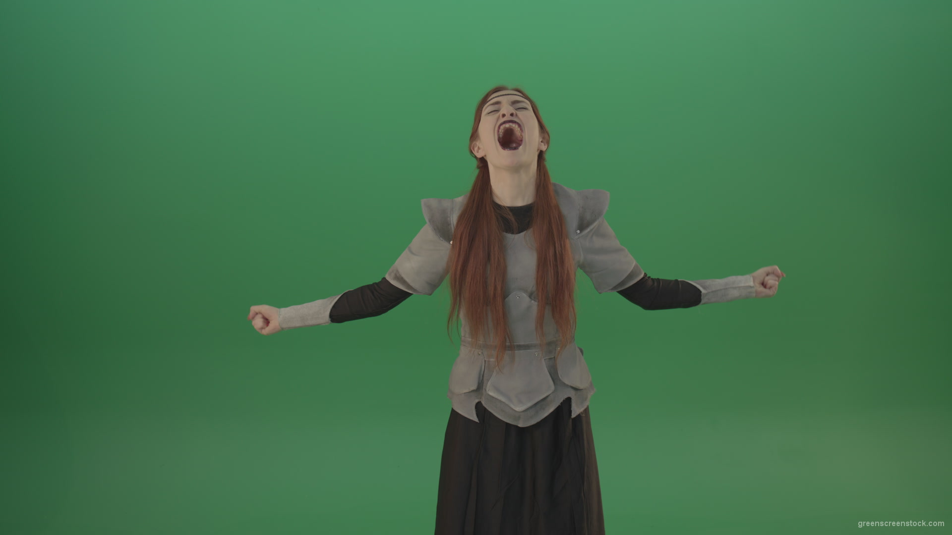 Cried-warrior-girl-releases-all-her-energy-cosplay-on-a-green-background_007 Green Screen Stock