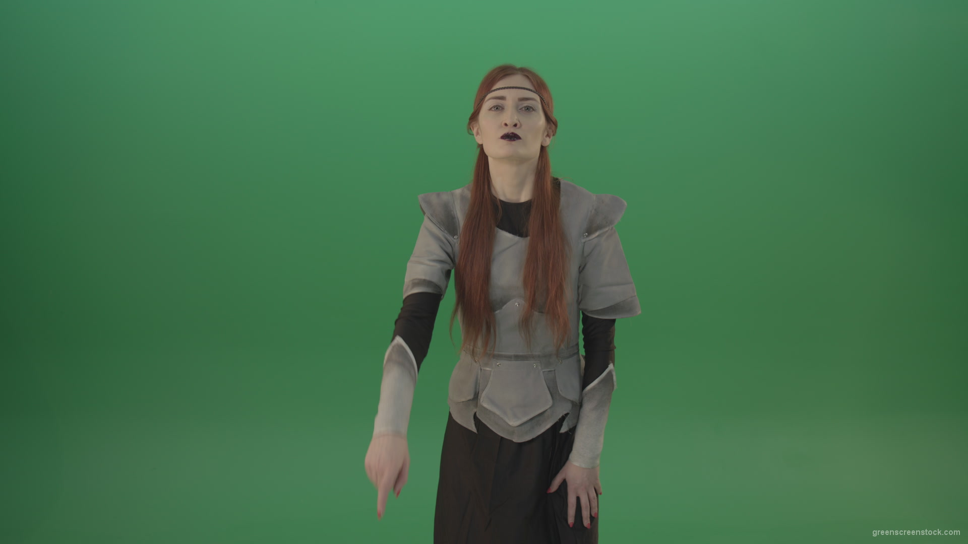 Dressed-Witch-Girl-in-medieval-costume-showing-quit-sign-emotion-with-finger-isolated-on-green-screen_002 Green Screen Stock
