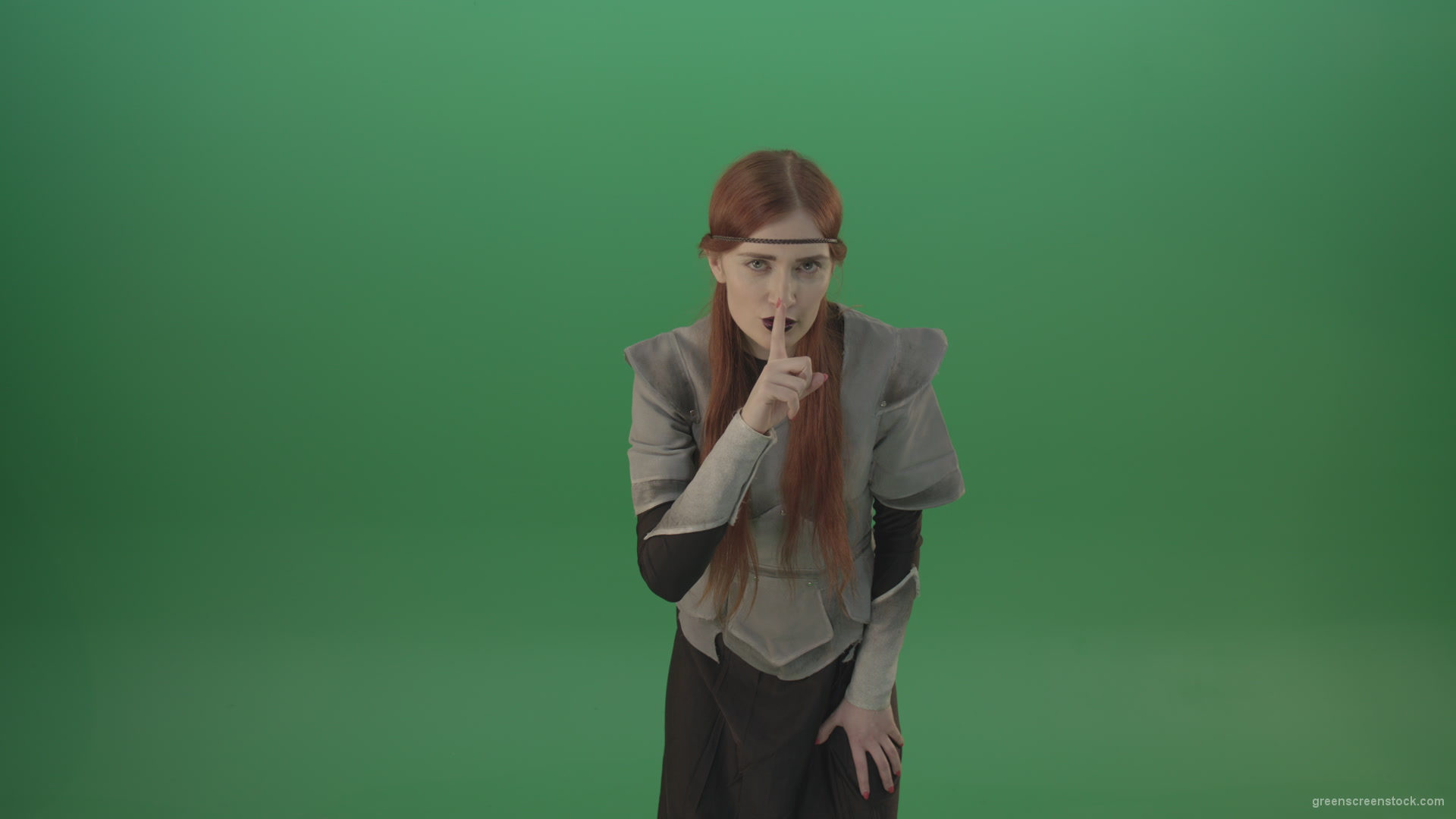 Dressed-Witch-Girl-in-medieval-costume-showing-quit-sign-emotion-with-finger-isolated-on-green-screen_005 Green Screen Stock