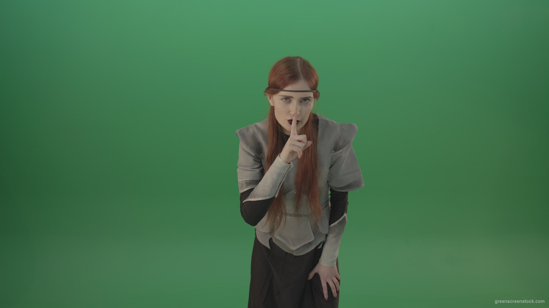 Dressed-Witch-Girl-in-medieval-costume-showing-quit-sign-emotion-with-finger-isolated-on-green-screen_006 Green Screen Stock
